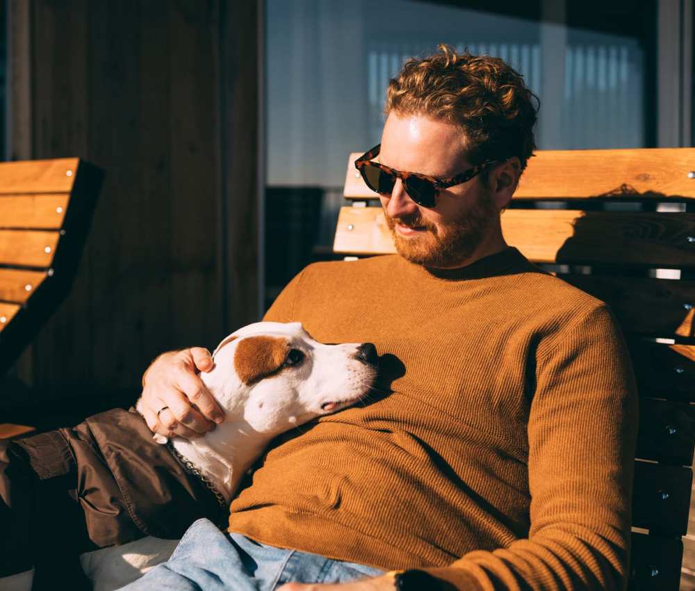 Resident with his dog at Gateway Hills in Ames, Iowa