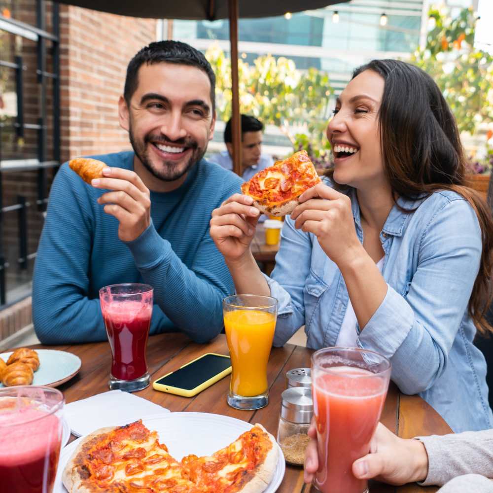 Residents having their favorite food at a restaurant nearby Westbury Apartments in Wayland, Michigan