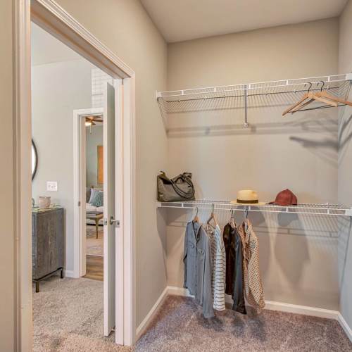 Spacious walk-in closet adjoining bedroom at Paxton Point Hope in Charleston. SC