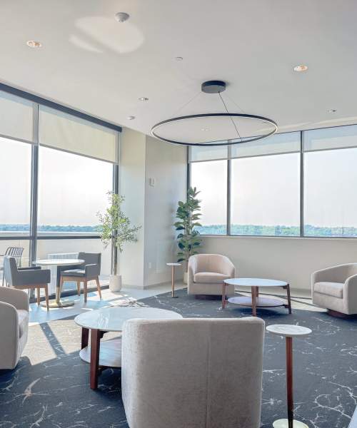 Residents sitting in the lobby at The Julian in Pittsburgh, Pennsylvania