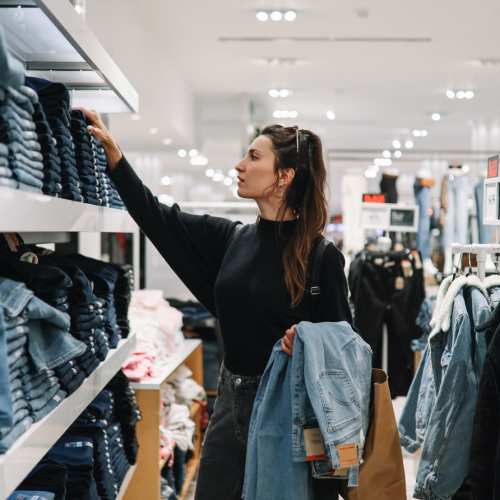 Resident shopping clothes near Canterbury Courts in Richardson, Texas