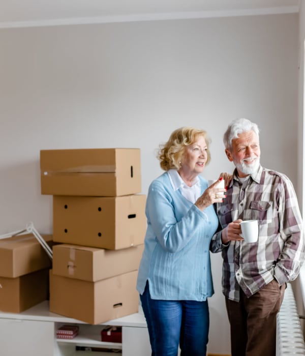 An elderly couple with boxes in their house near Key Storage - Hwy 151 in San Antonio, Texas Key Storage - Hwy 151 in San Antonio, Texas