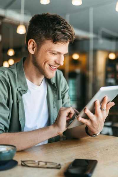 Resident using tab in cafe near Georgetown, Texas