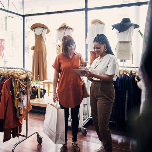 Resident woman shopping in a boutique at Smallwood Gardens in Waldorf, Maryland