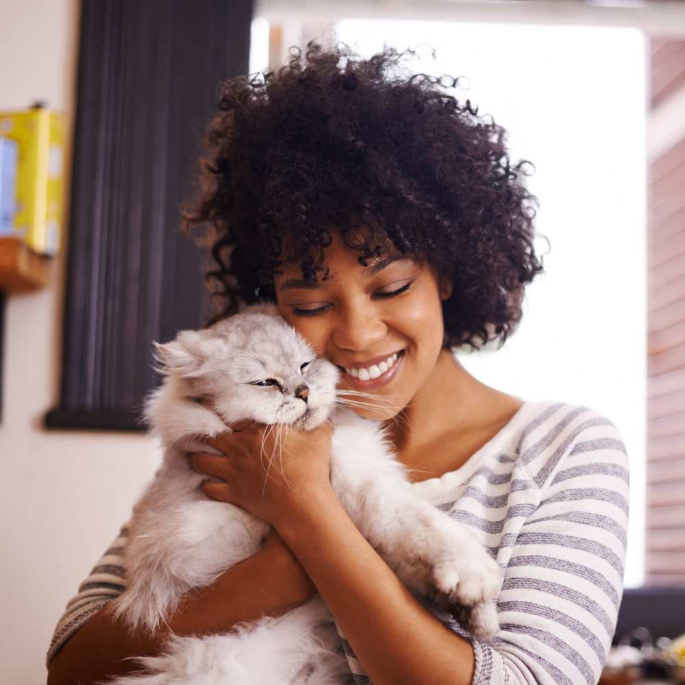 Resident with her cat at One Belmar Place in Lakewood,Colorado
