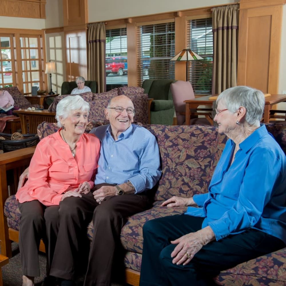 Residents laughing and talking at The Springs at The Waterfront in Vancouver, Washington