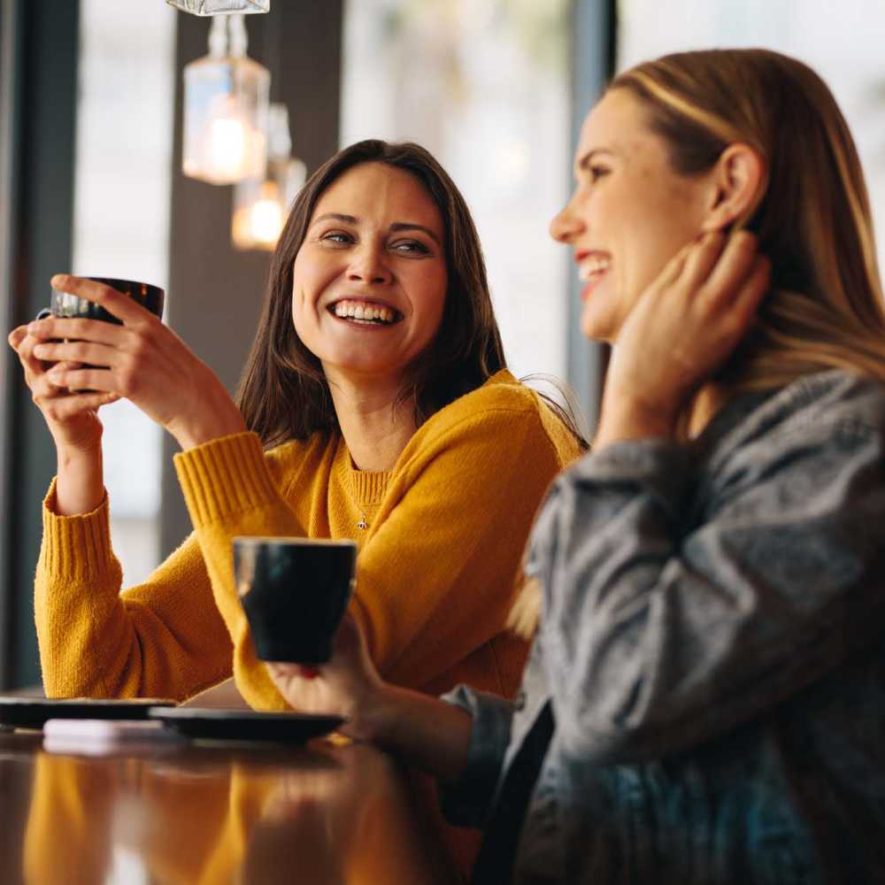 Friends having coffee near Oaks Pentagon Village in Edina, Minnesota