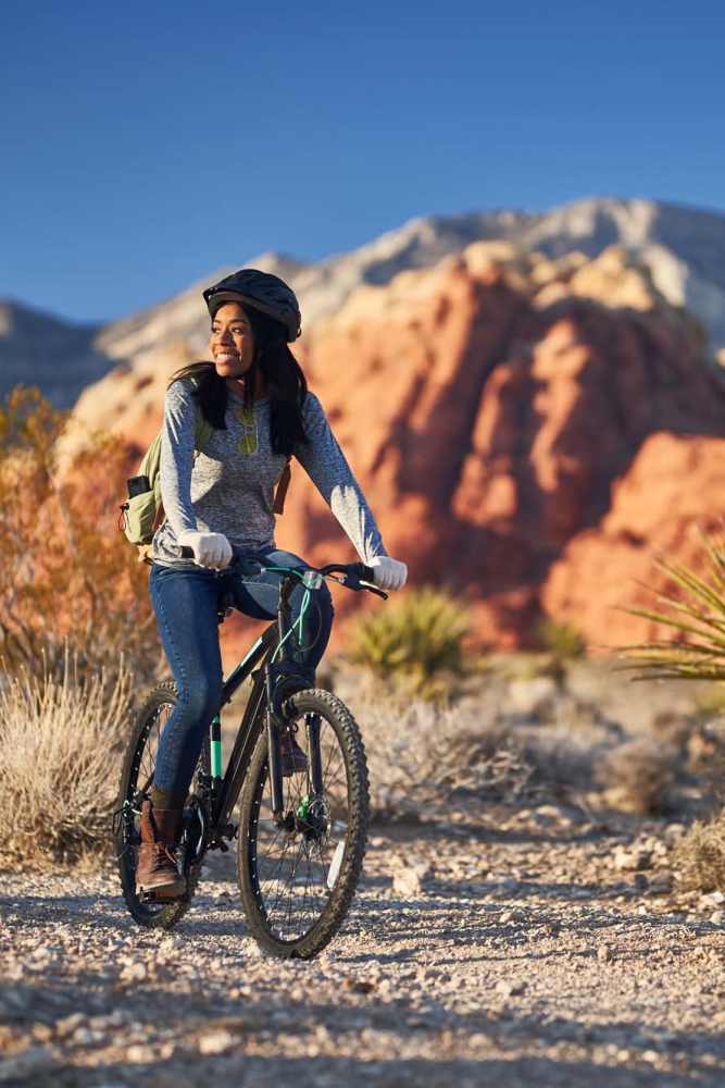 Resident biking near Pinyon Apartments in Reno, Nevada