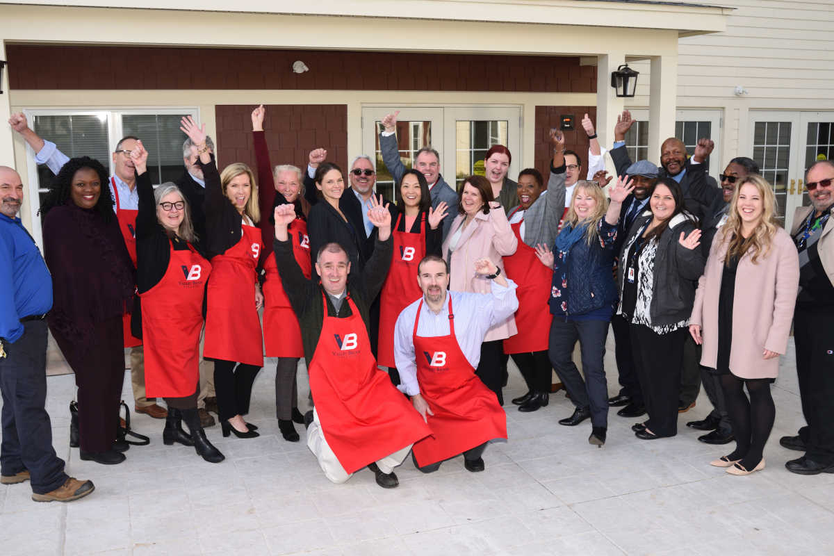 Happy community at Affordable Housing and Services Collaborative in Braintree, Massachusetts