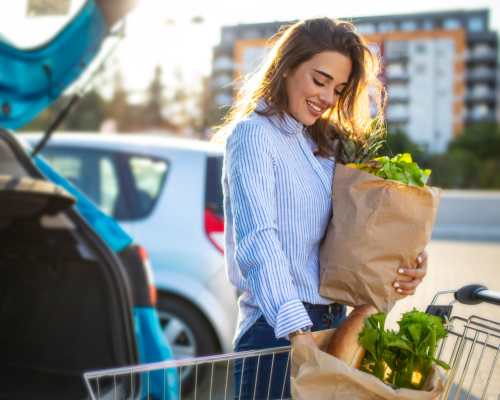 Resident loading her car with groceries near Presidential Arms Apartment Homes in Allison Park, Pennsylvania