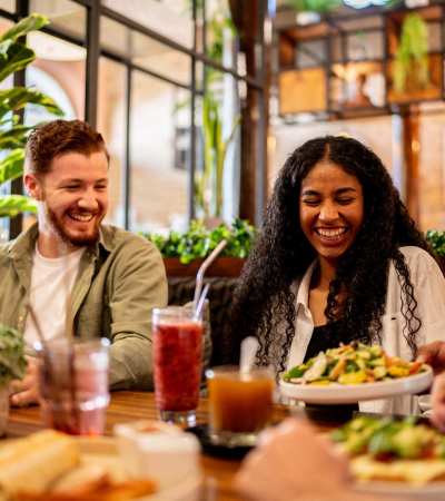Residents eating lunch at a favorite restaurant near Adagio at Westshore Palms in Tampa, Florida