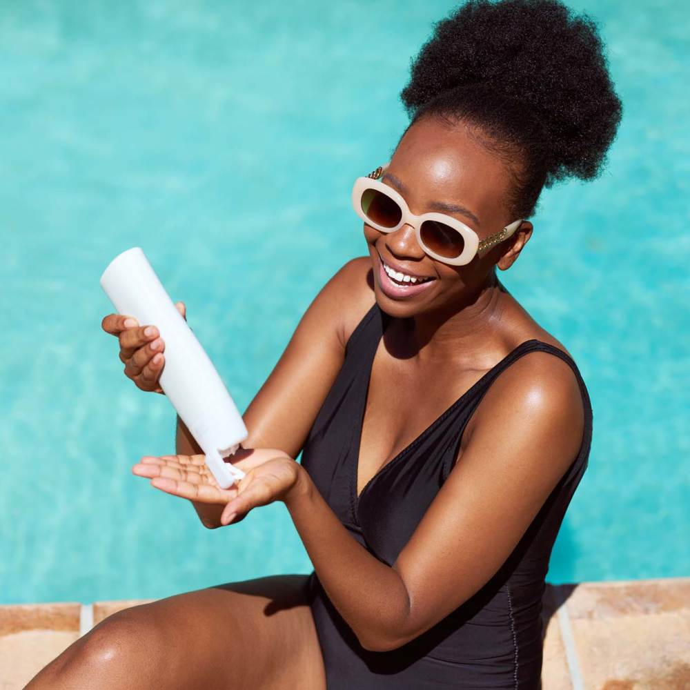 Woman by the poolside at The Oliver in Charlotte, North Carolina