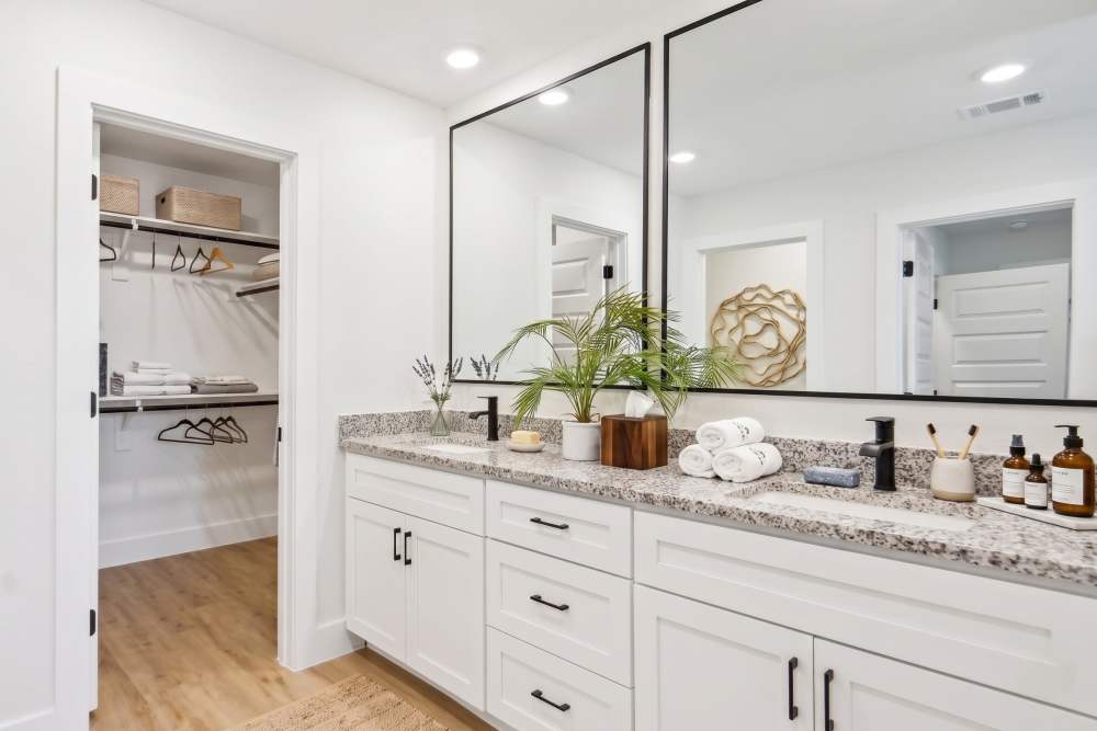Bathroom With Large Vanities at BB Living The Tribute in The Colony, Texas