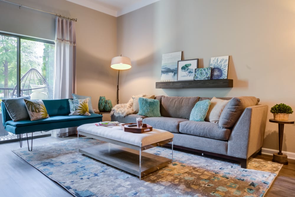 Modern living room at Celsius Apartments in Charlotte, North Carolina managed by Hercules Living.