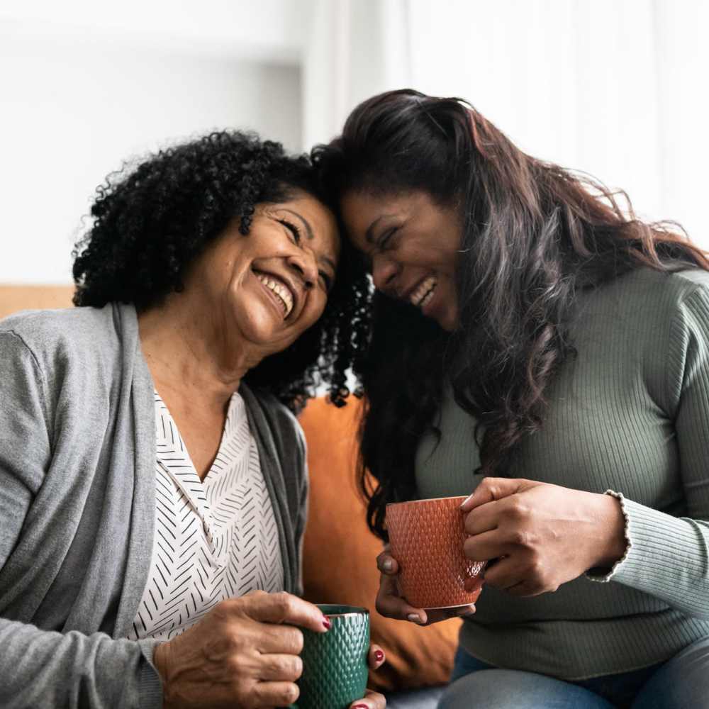 Residents smiling at The Oliver in Charlotte, North Carolina