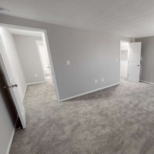 Carpeted room at Thirty43 by the Greene in Kettering, Ohio