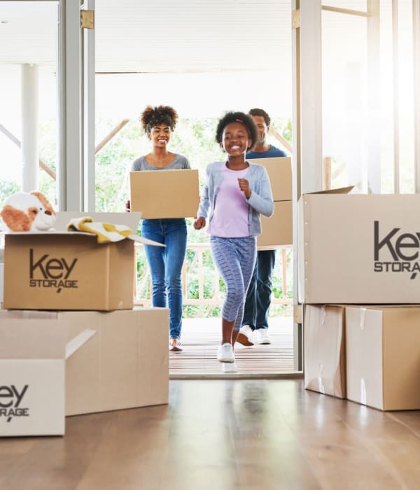 A family moving into their new home near Key Storage in San Antonio, Texas