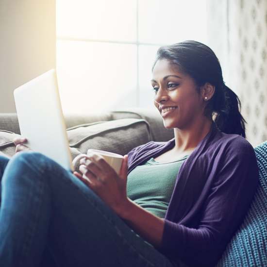 Resident relaxing in her home at Southridge Apartments in Culpeper, Virginia