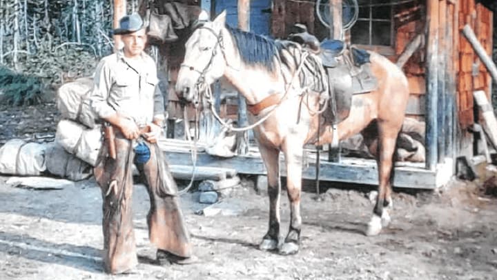 Jim Hickman as new forester with horse early in his career