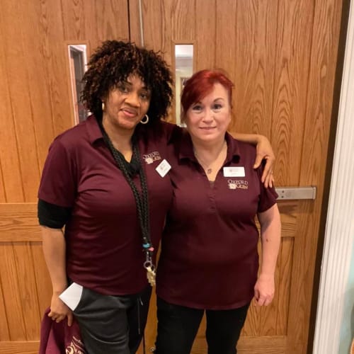 Resident peace sign at Oxford Glen Memory Care at Sachse in Sachse, Texas