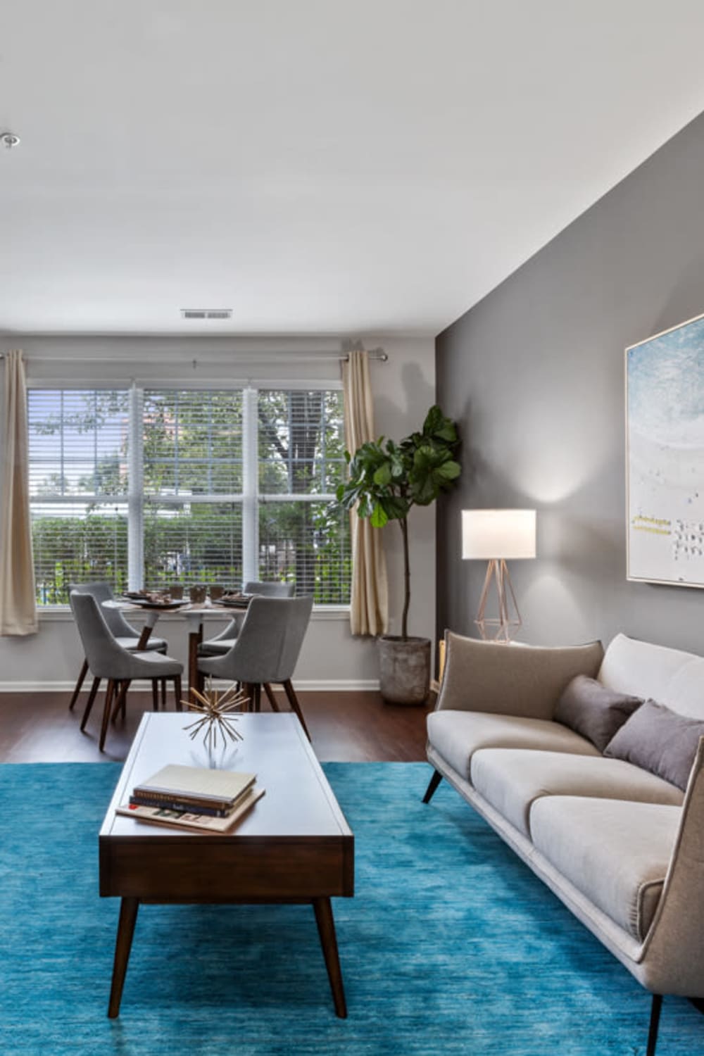 Spacious and modern living room in a model home at Sofi Lyndhurst in Lyndhurst, New Jersey