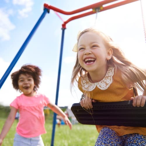 Children playing on a playground at Eucalyptus Ridge in Lakeside, California