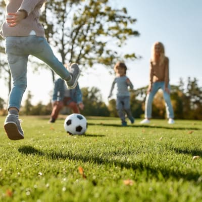 kids playing outside at a park near  Heartwood in Joint Base Lewis McChord, Washington