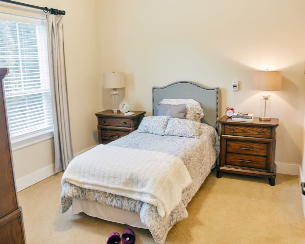 A decorated bedroom at Harmony at West Ashley in Charleston, South Carolina