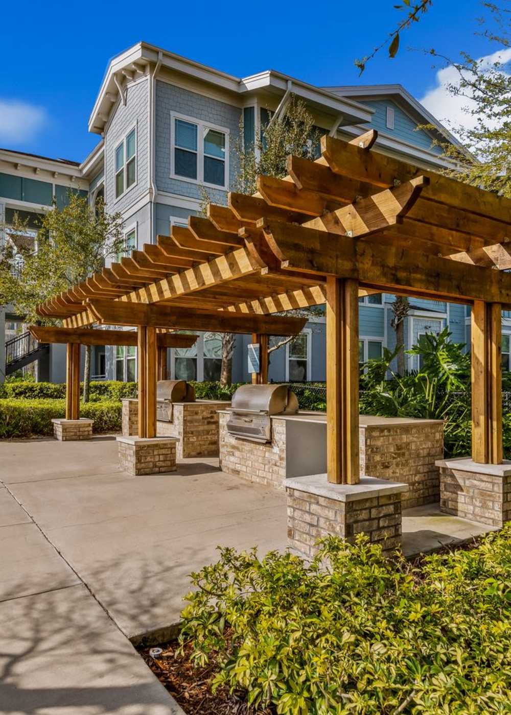 Outdoor barbeque area at The Crosby at Towne Center in Sanford, Florida