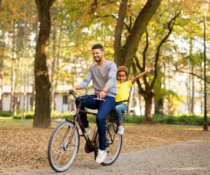 Resident cycling near Baker Manor Apartments in Macclenny, Florida