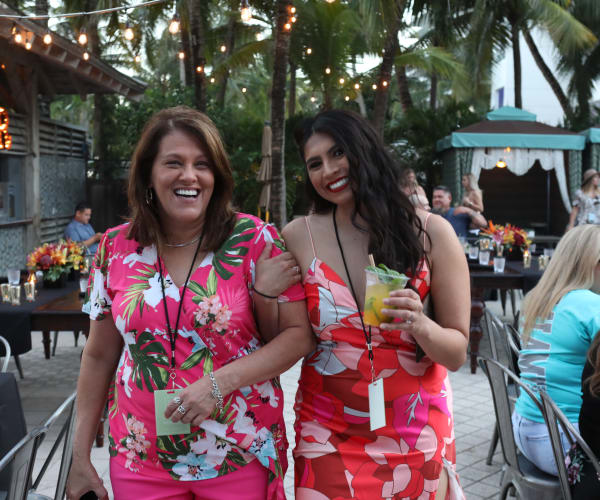 Teammates at a beach themed event at Campus Life & Style in Austin, Texas