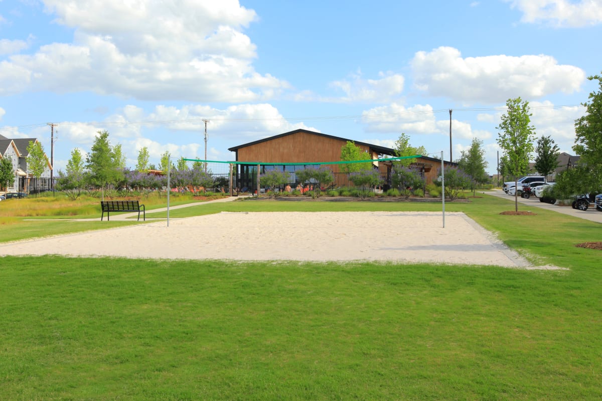 Sand volleyball court at BB Living Harvest in Argyle, Texas