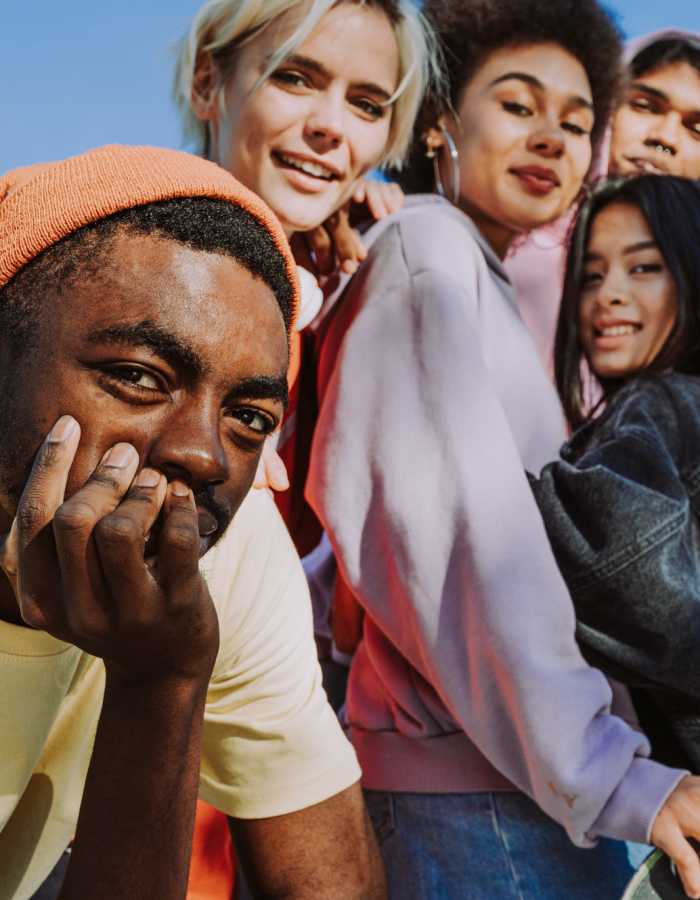 Students taking a selfie near Midtown 905 in Denton, Texas