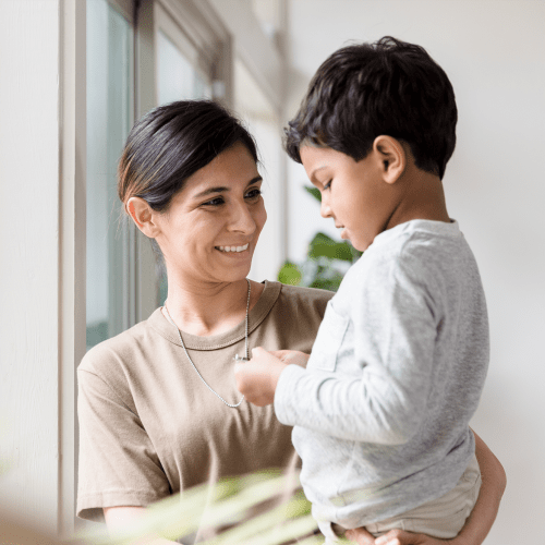 A mother holding her son at Eucalyptus Ridge in Lakeside, California