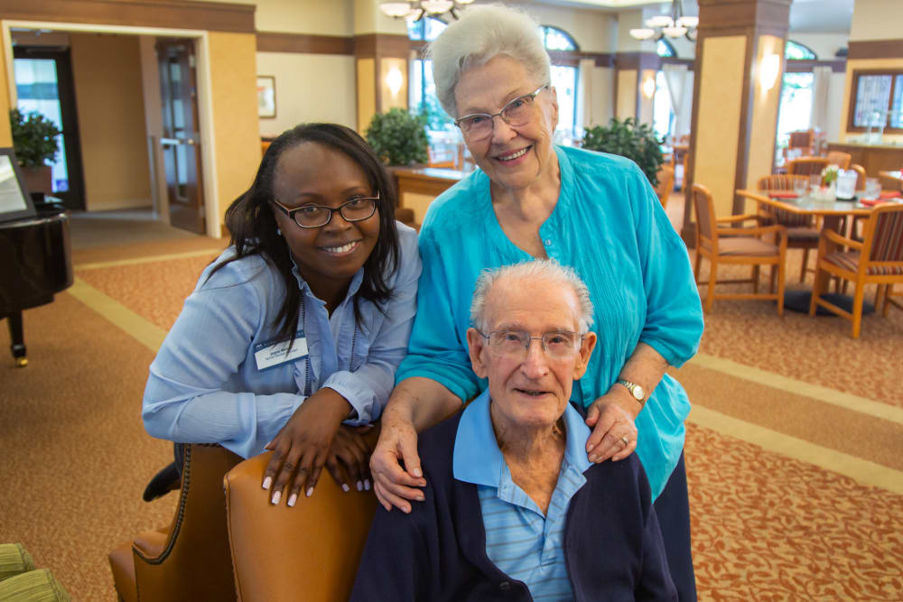 Residents and a staff member pose for a picture at Merrill Gardens at Campbell in Campbell, California. 