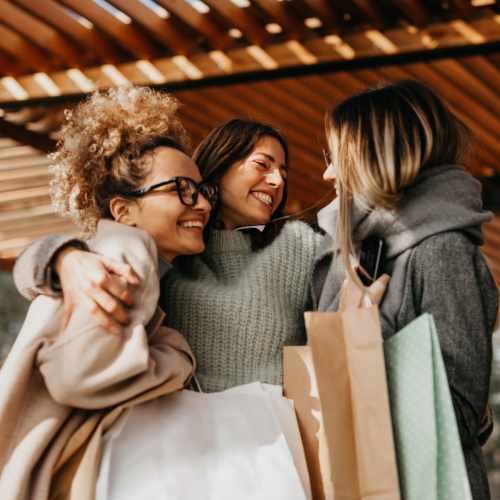 Residents with shopping bags near LeSilve in Middleton, Wisconsin