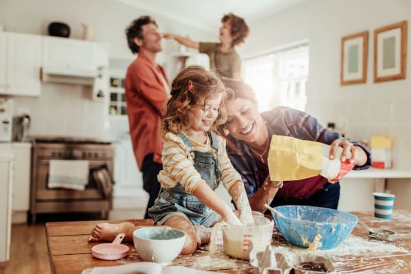 a family playing at home at Country Ranch Apartments in Fort Collins, Colorado