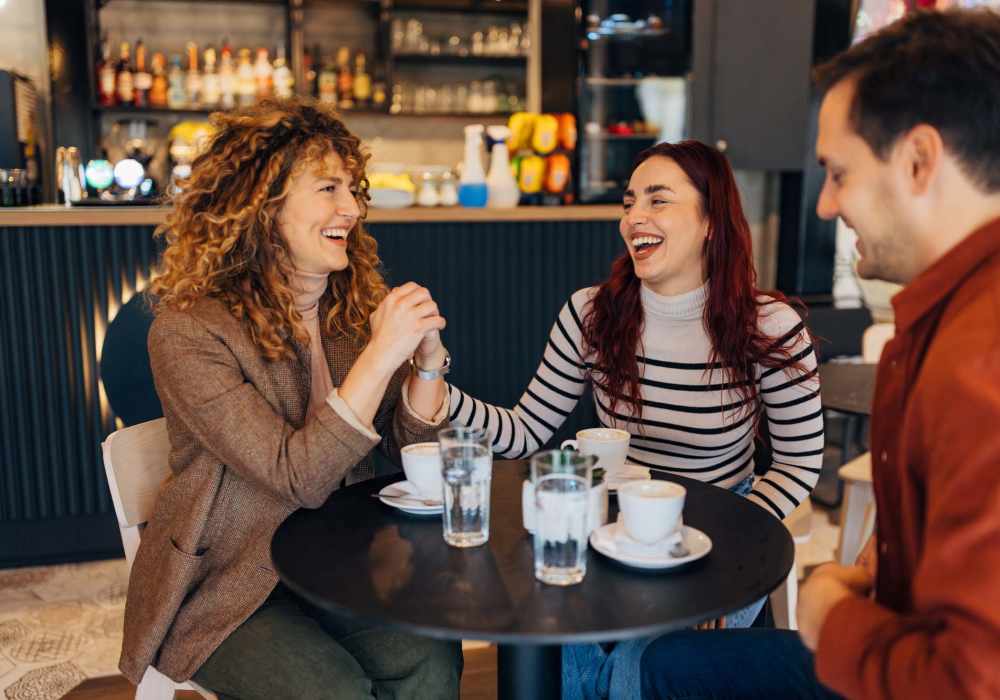 Friends enjoying coffee at La Vina Apartments in Livermore, California
