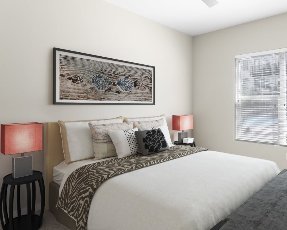 Bright bedroom with a ceiling fan at The Tessera in Phoenix, Arizona