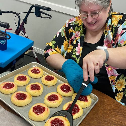 Resident with dessert at Saunders House in Wahoo, Nebraska