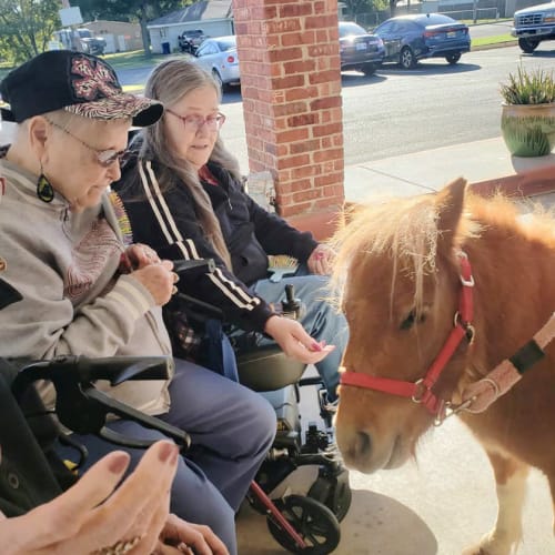 Residents with a horse Canoe Brook Assisted Living in Duncan, Oklahoma