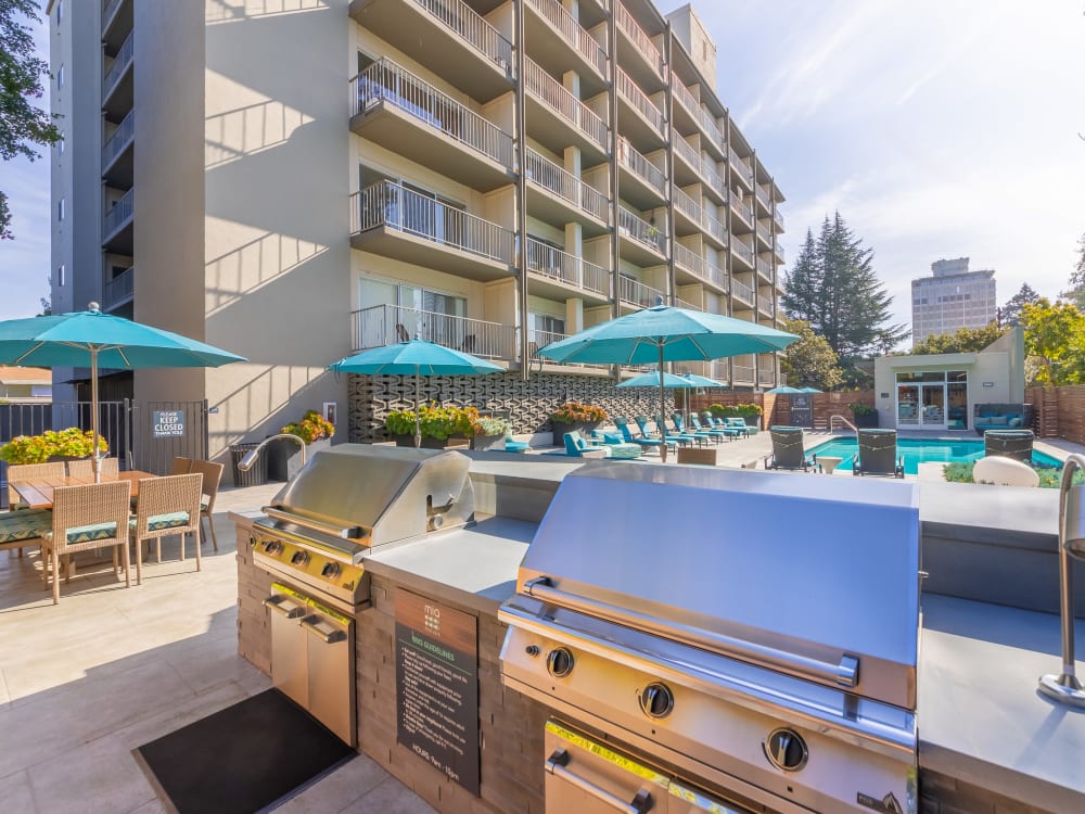 Barbecue area with shaded seating at Mia in Palo Alto, California