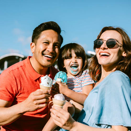 A family eating ice cream near Capeharts West in San Diego, California
