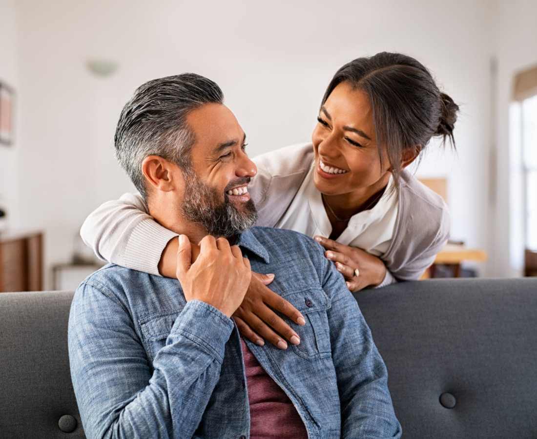 Couple in their living room at Waters Edge in Sacramento, California