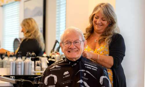 Resident trimming up his hair at The Barclay in Charlottesville, Virginia