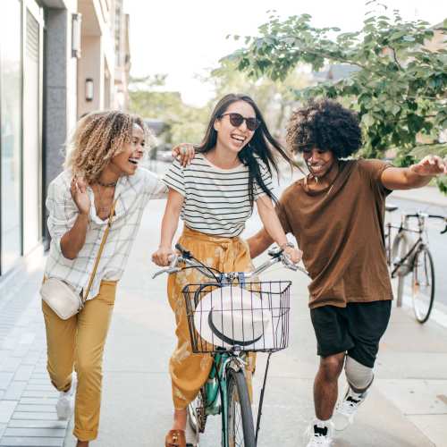 Happy friends near The Gramercy Residences in Las Vegas, Nevada