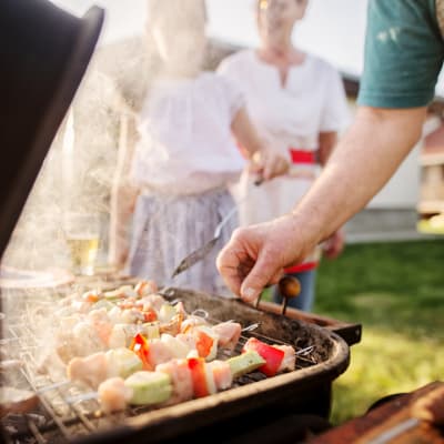 Grilling food at a community event at Pecan Crescent in Chesapeake, Virginia