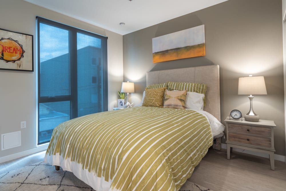 Spacious bedrooms with floor to ceiling windows and views at Division 30 in Portland, Oregon