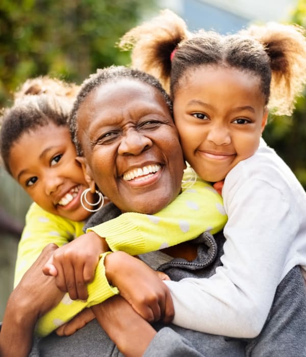 A family embracing each other near Key Storage in San Antonio, Texas