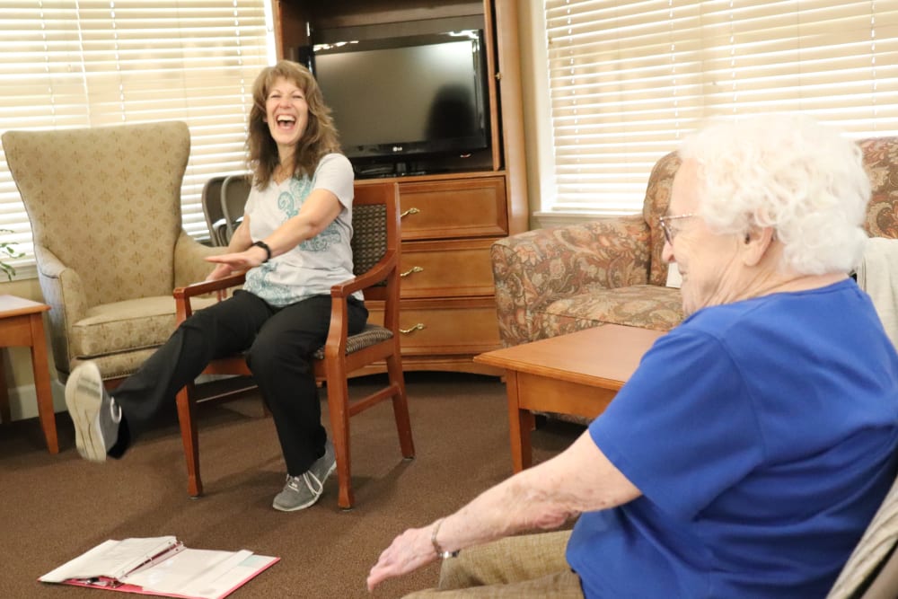 Resident exercising with caregiver at The Springs at Willowcreek in Salem, Oregon